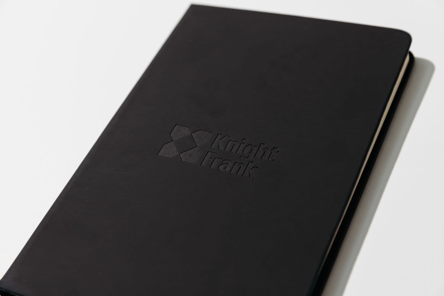 A debossed branded Knight Frank notebook