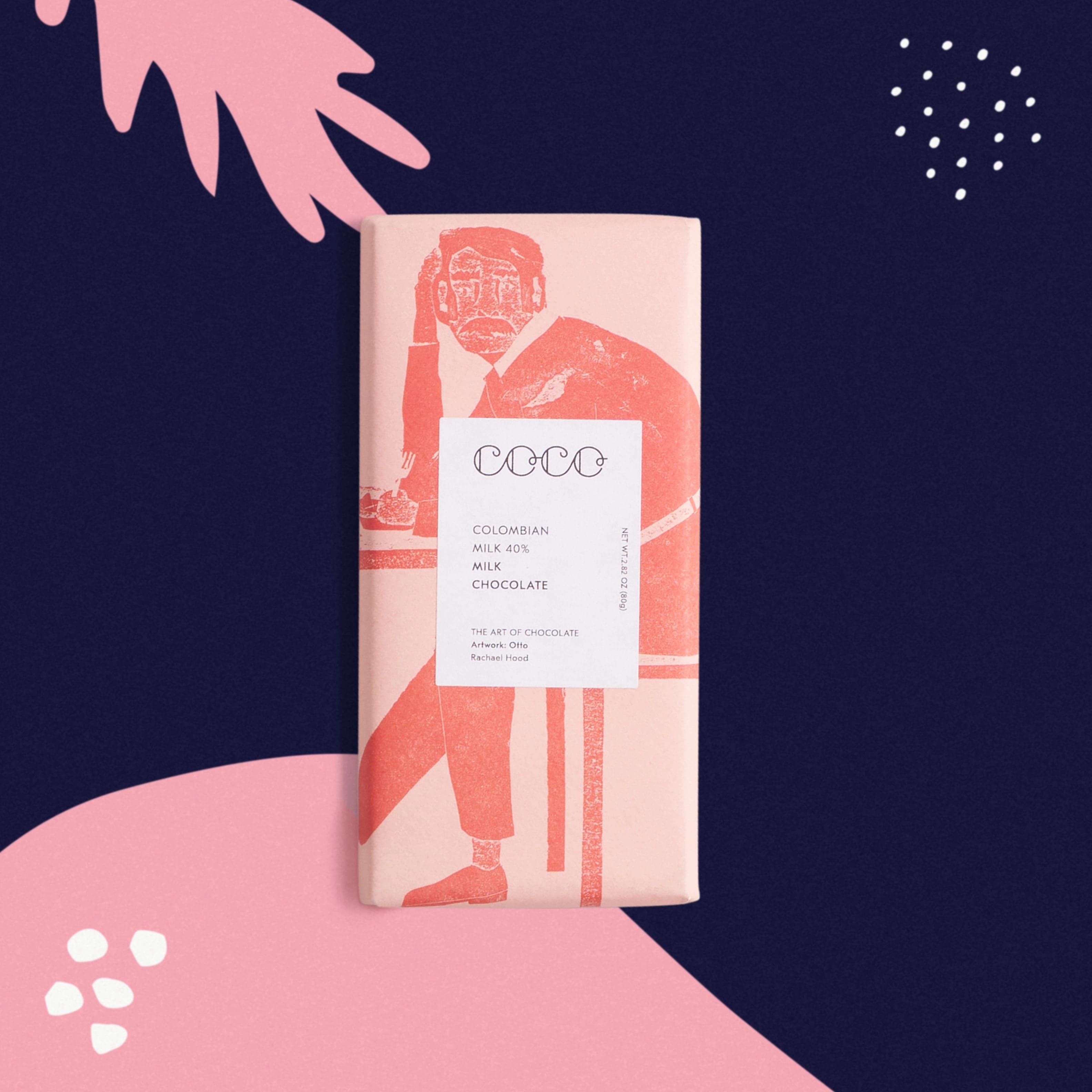 A Coco milk chocolate bar in a pink illustrated wrapper